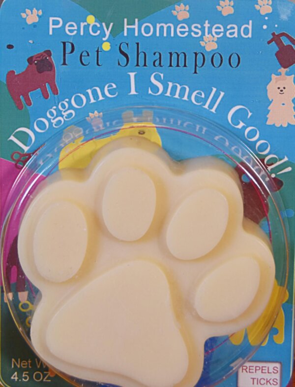 This is a picture of a package of Dog Shampoo called Doggone I Smell Good! Blue background with cats and dogs in various stages of grooming pictures.