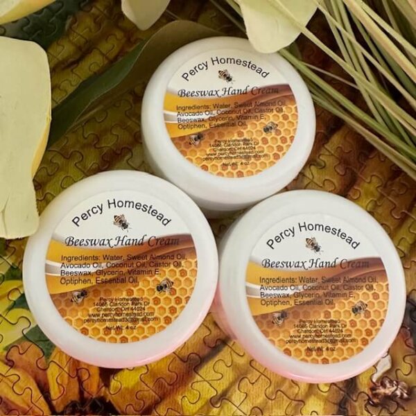 Honey Hand Cream With Beeswax on puzzle surrounded by lilies